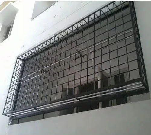 Traditional welded MS grill boxing in a window
